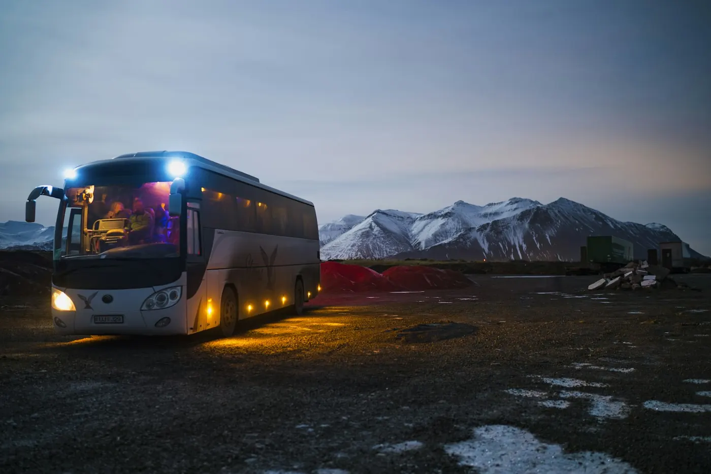 Charter coach at dusk